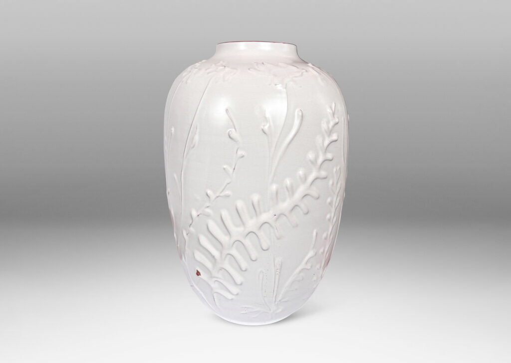 Gallery BACtapered form with slip-sculpted wildflowers in relief