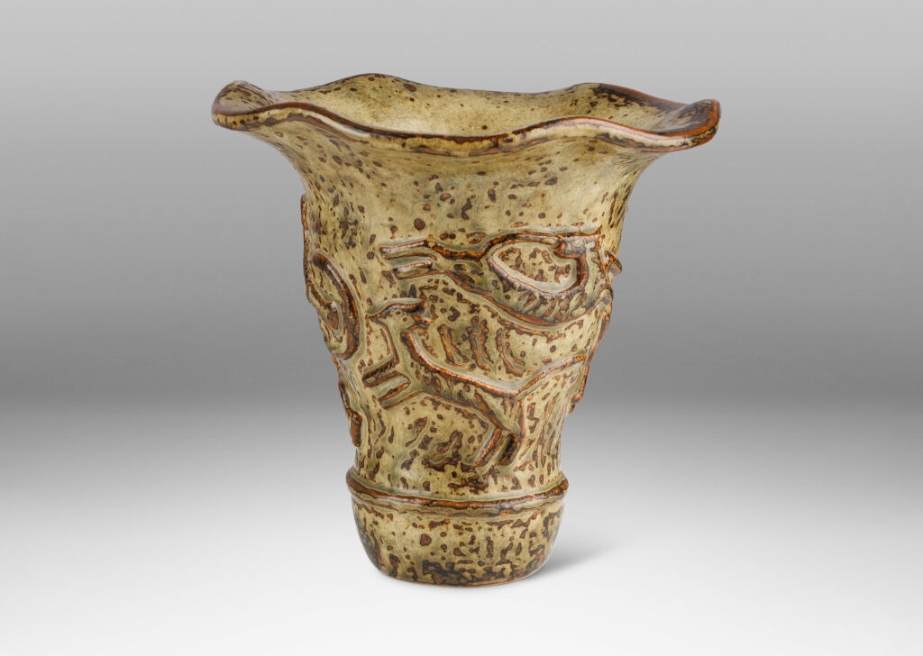 Gallery BAC onical form with undulating lip and relief mythological figures, with a masterful brown and light greige “Sung” glaze