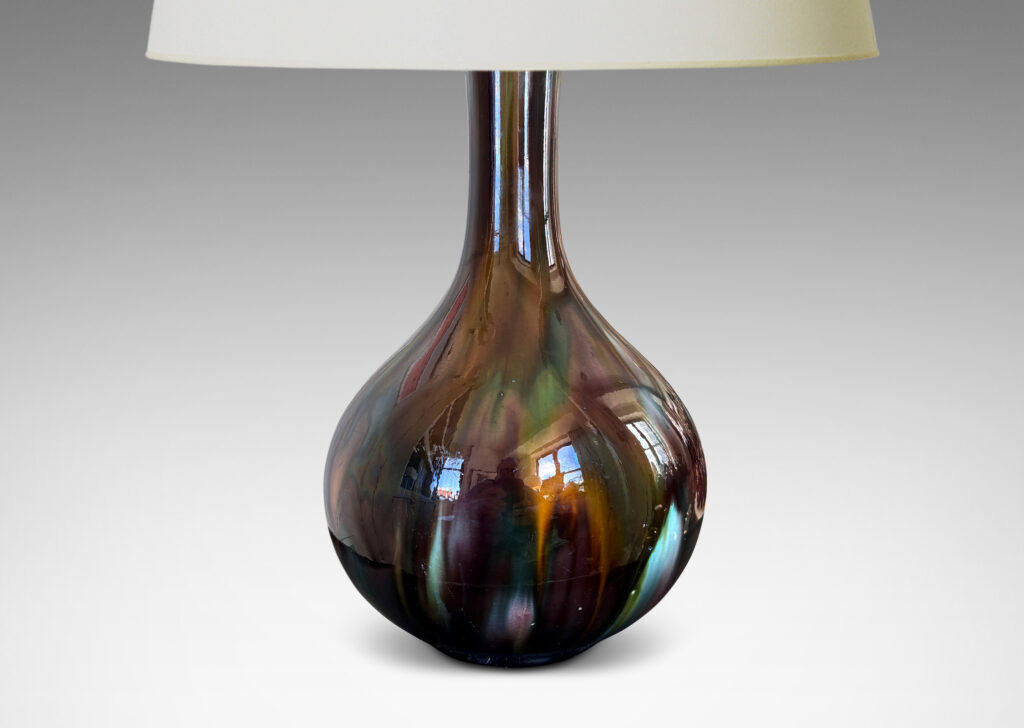 Gallery BAC bulbous form with sprouting neck, glazed in flowing green, brown and purple