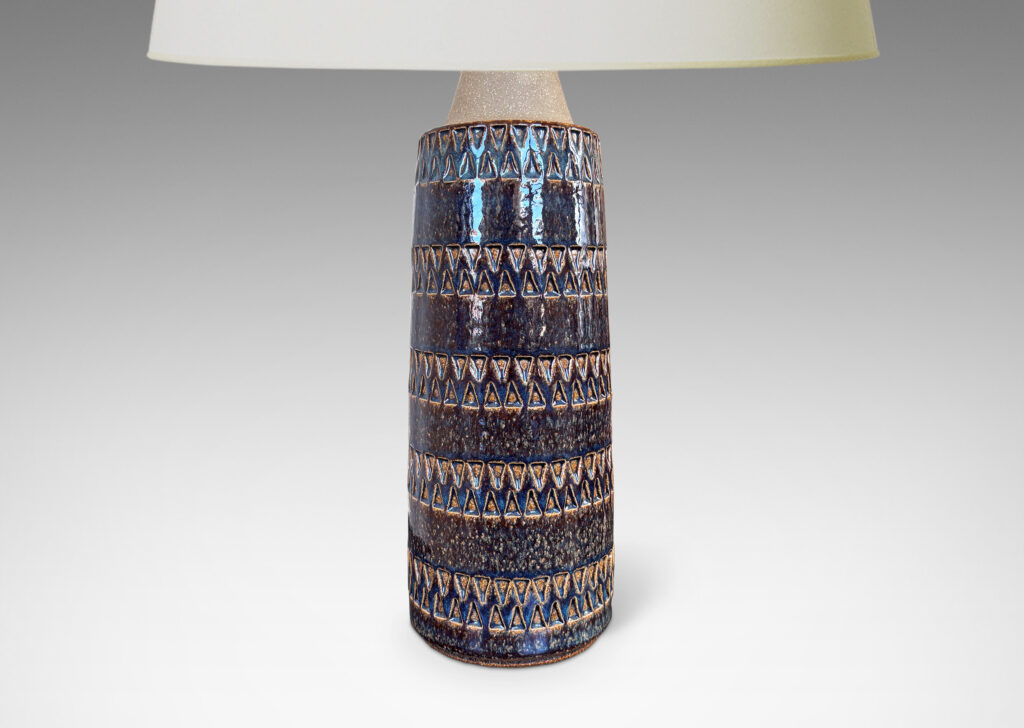 Gallery BAC welling cylindrical form with bands of impressed triangle motifs, partially glazed in glossy gray-blue