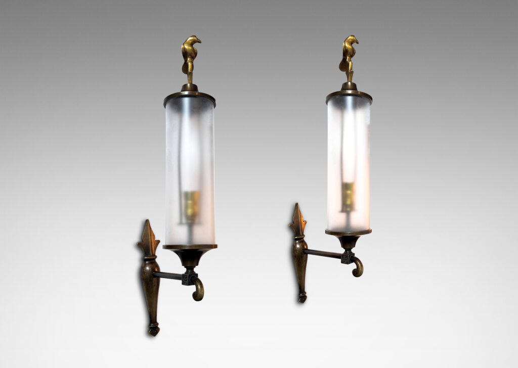 Gallery BAC cylindrical shades with baroque mounts, scroll arms, and bird finials
