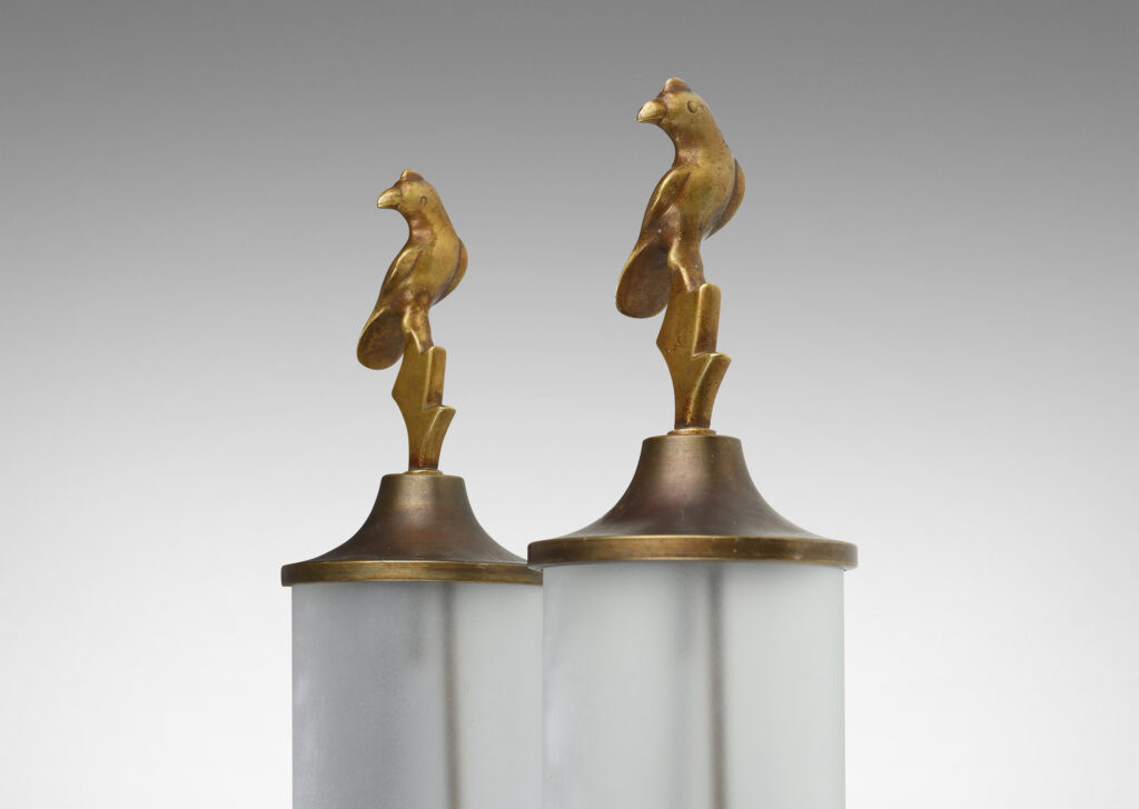 Gallery BAC cylindrical shades with baroque mounts, scroll arms, and bird finials