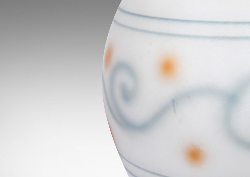 Gallery BAC semi-opaque ovoid form with velvety sandblasted finish with back-painted blue pinstripes and scrolls and orange dots