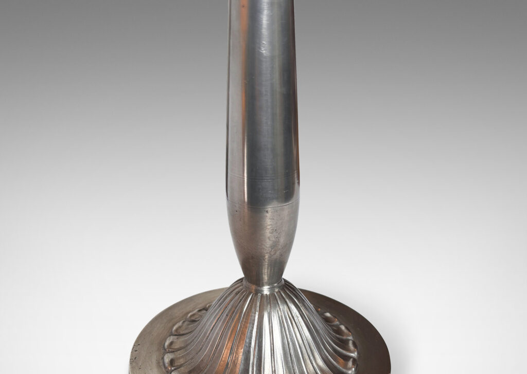 Gallery BAC swelling stand sprouting from a high relief rosette on a disk base