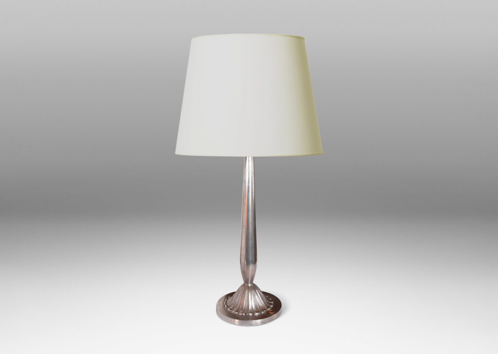 Gallery BAC swelling stand sprouting from a high relief rosette on a disk base