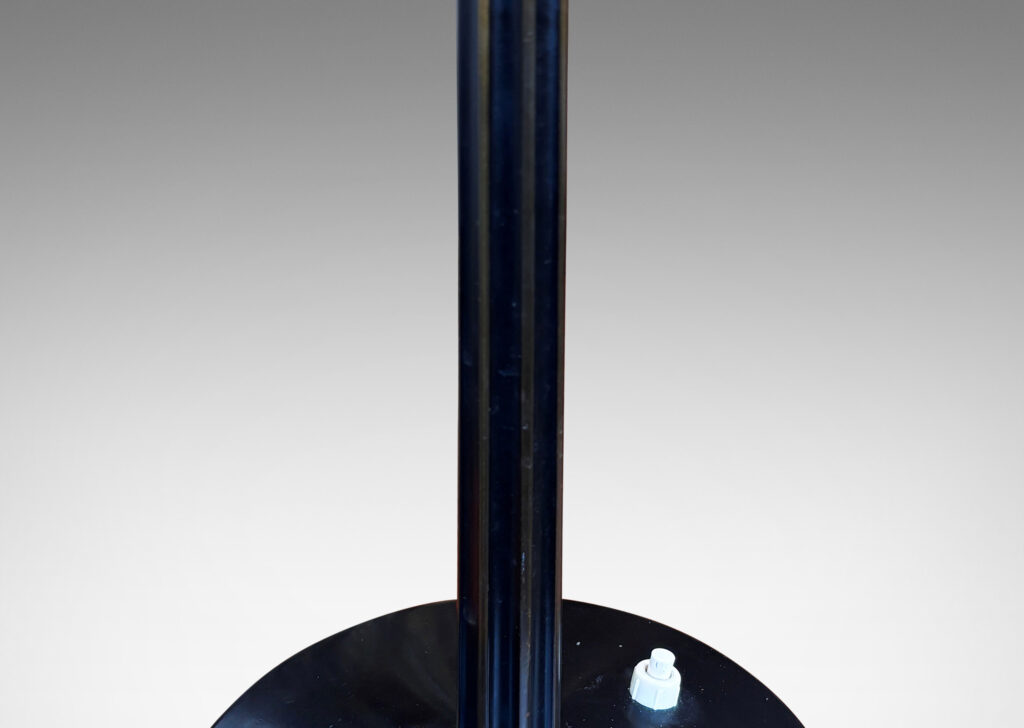 Gallery BAC fluted stand and disk base with a deep patination, accented with polished edges