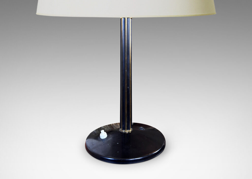 Gallery BAC fluted stand and disk base with a deep patination, accented with polished edges