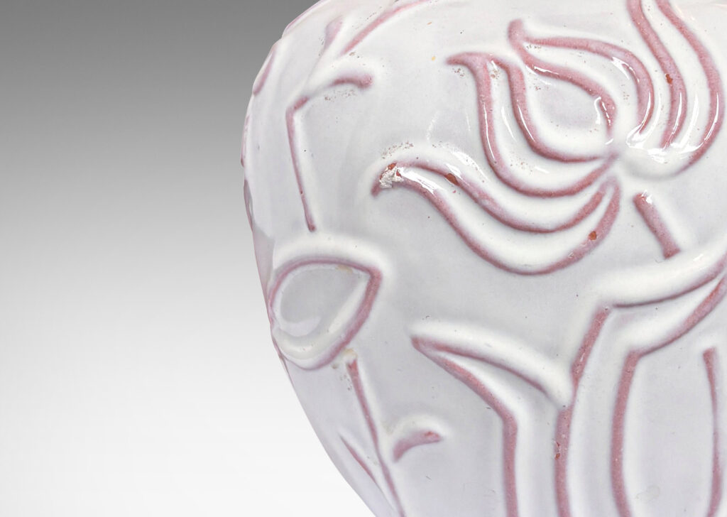 Gallery BAC apered apple-like forms with abstracted floral designs in relief, glazed in a shiny white
