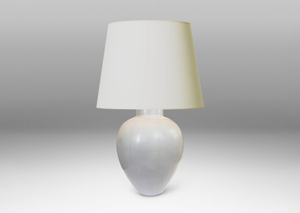 Gallery BAC tapered ovoid form with subtle relief meridian bands, glazed in a soft ivory