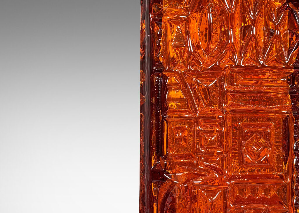 Gallery BAC square canister form with geometric reliefs and a warm saturated whisky tone