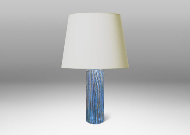 Gallery BAC tall cylindrical form with organically modeled fluting, glazed in an indigo blue