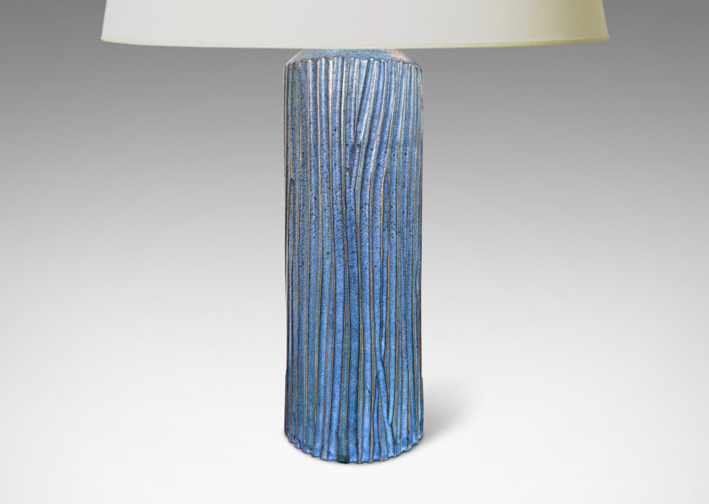 Gallery BAC tall cylindrical form with organically modeled fluting, glazed in an indigo blue