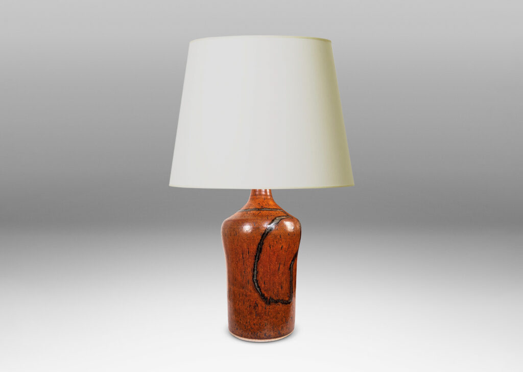 Gallery BAC cylindrical form with swelling shoulders and sprouting neck, glazed in rust-brown with abstract design in gray-red luster