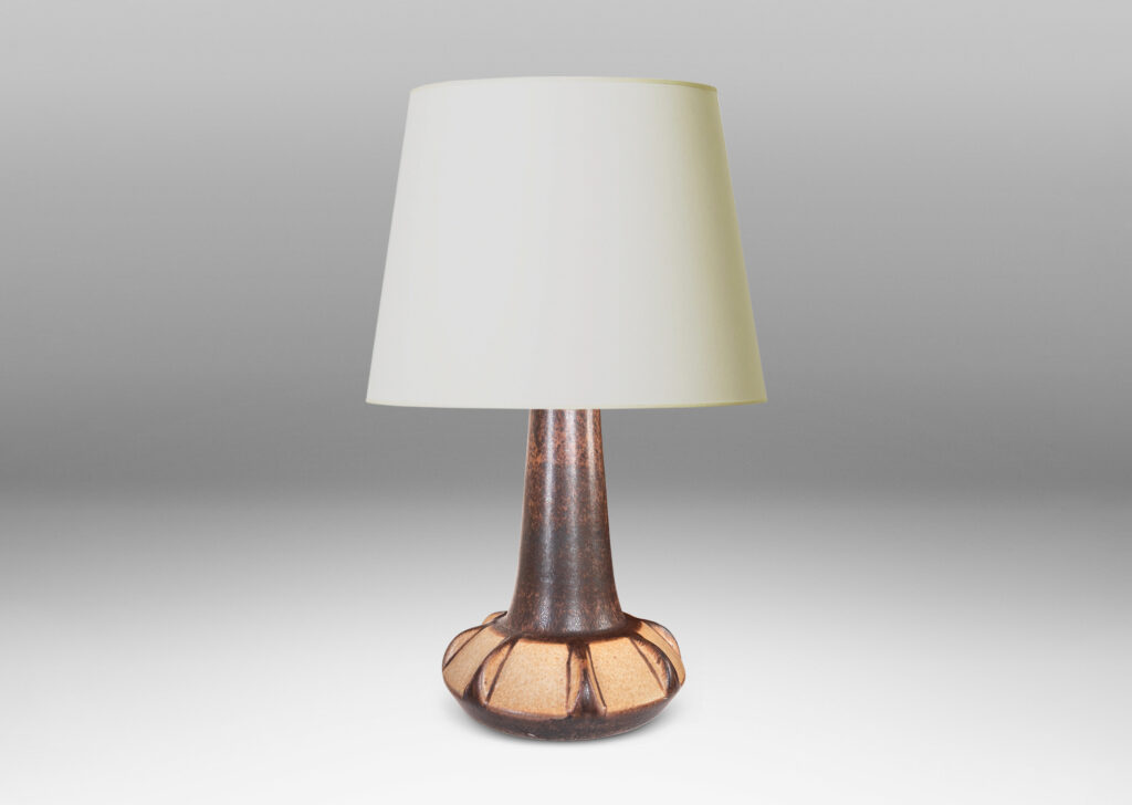 Gallery BAC ow angled and notched form with tall neck, glazed in dark brown with beige