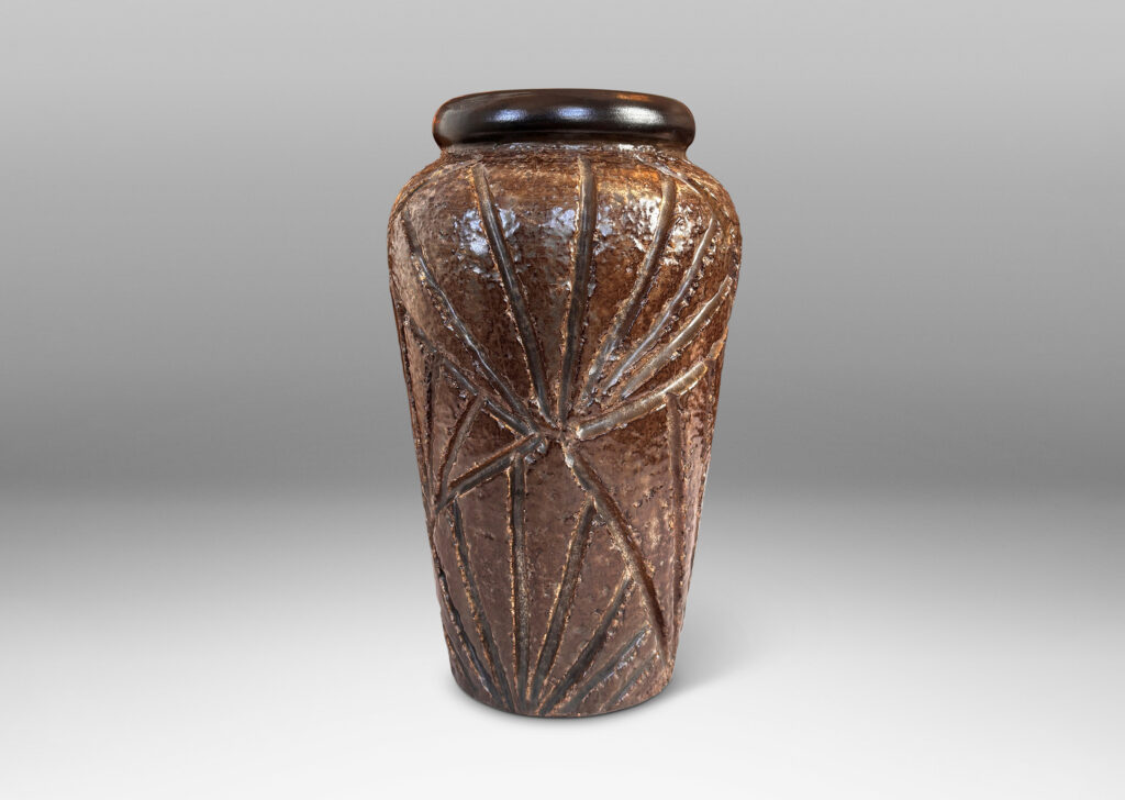 Gallery BAC large tapered form with rugged carved palmate pattern and smooth bead lip, glazed in medium and dark brown