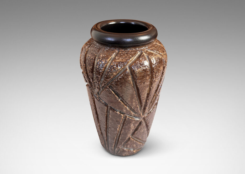 Gallery BAC large tapered form with rugged carved palmate pattern and smooth bead lip, glazed in medium and dark brown