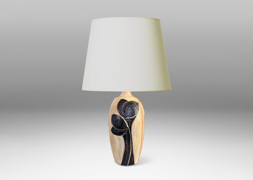 Gallery BAC tall swelling forms with applied relief abstract foliage and coved necks, glazed in ivory, tan, and bluish-black