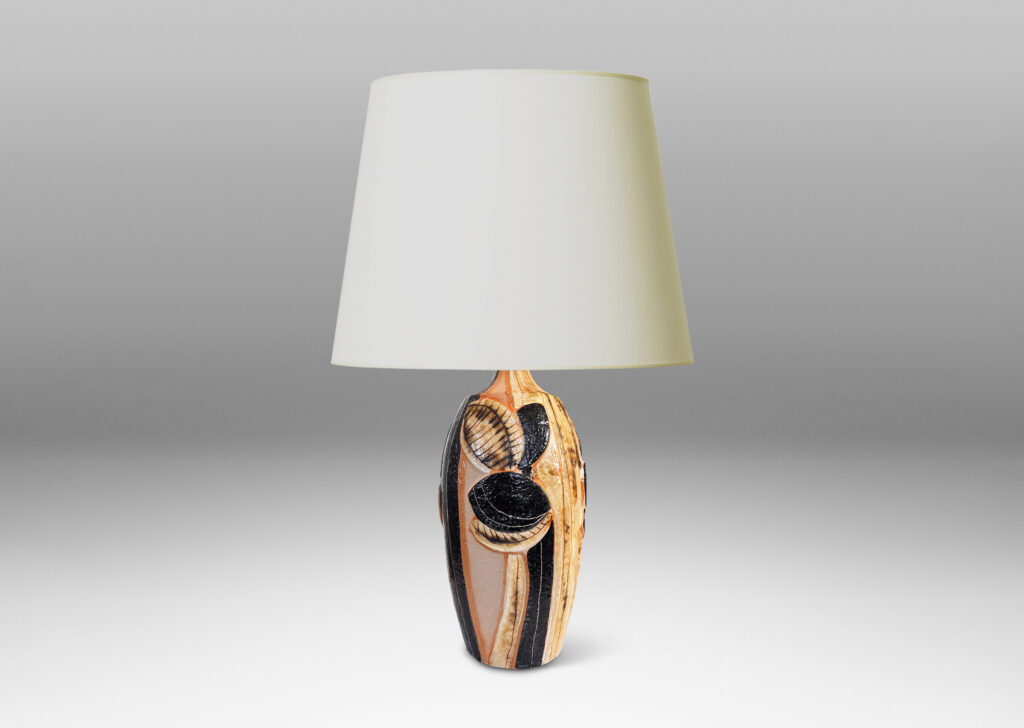 Gallery BAC tall swelling forms with applied relief abstract foliage and coved necks, glazed in ivory, tan, and bluish-black