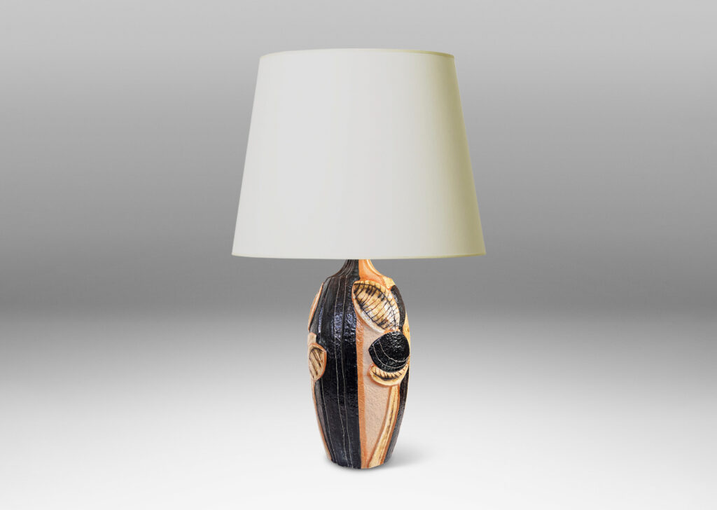 Gallery BAC tall swelling forms with applied relief abstract foliage and coved necks, glazed in ivory, tan, and bluish-black