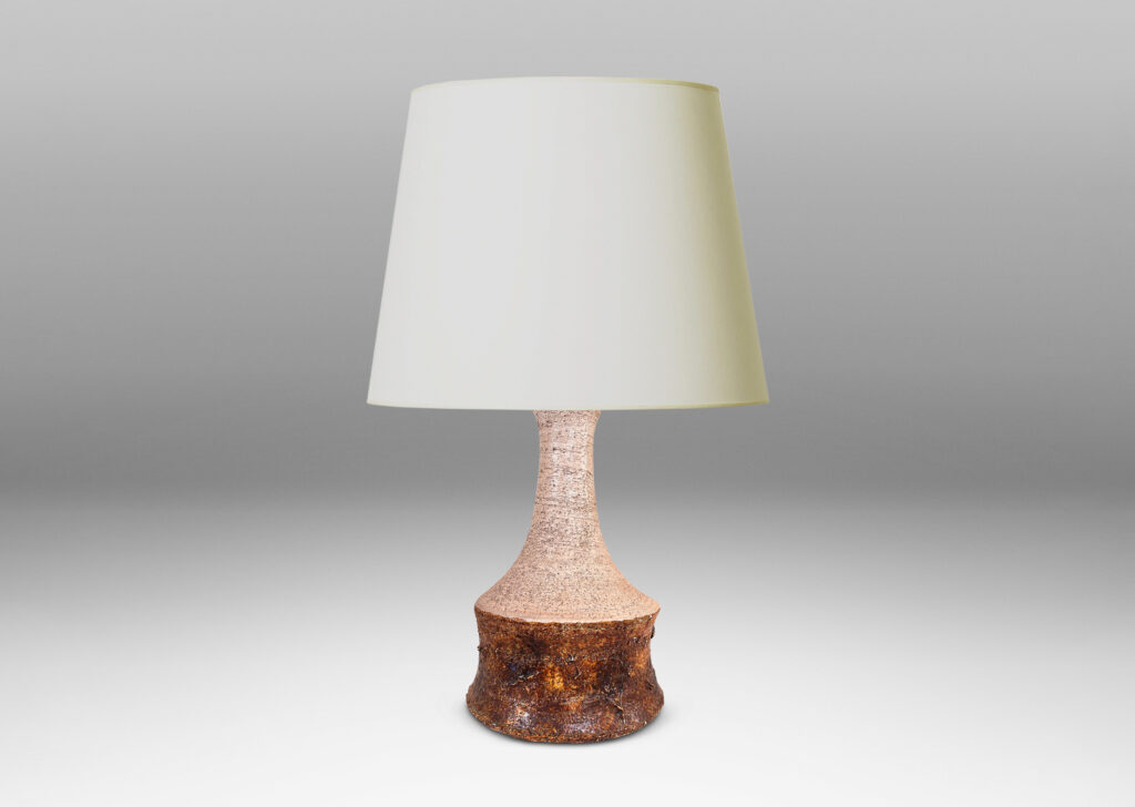 Gallery BAC cove-sided drum form with spouting neck, in textured grog ceramic, glazed in matte ivory and brown