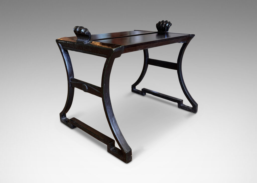 Gallery BAC having muscular lines, classical motifs, and shell handles, featuring verdigris green-black frames; painted cast iron and wood