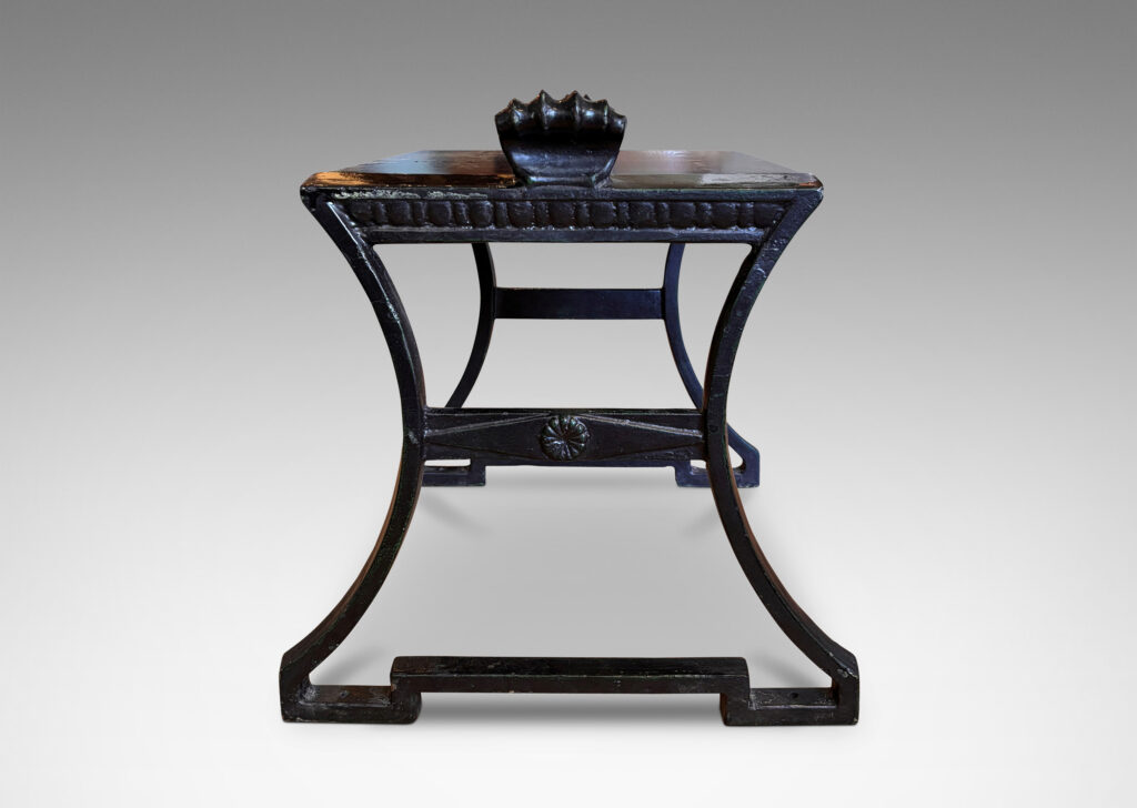 Gallery BAC having muscular lines, classical motifs, and shell handles, featuring verdigris green-black frames; painted cast iron and wood