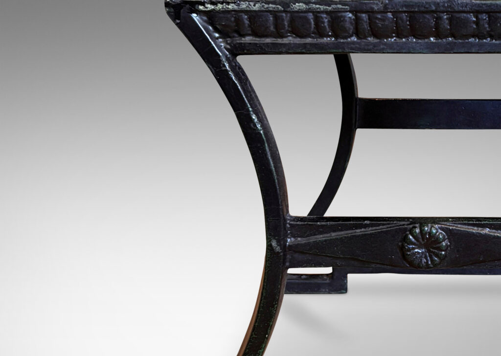 Gallery BAC having muscular lines, classical motifs, and shell handles, featuring verdigris green-black frames; painted cast iron and wood