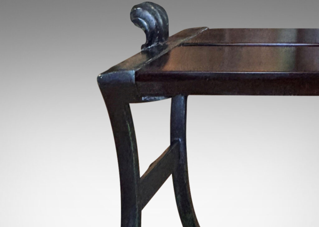 Gallery BAC having muscular lines, classical motifs, and shell handles, featuring verdigris green-black frames; painted cast iron and wood