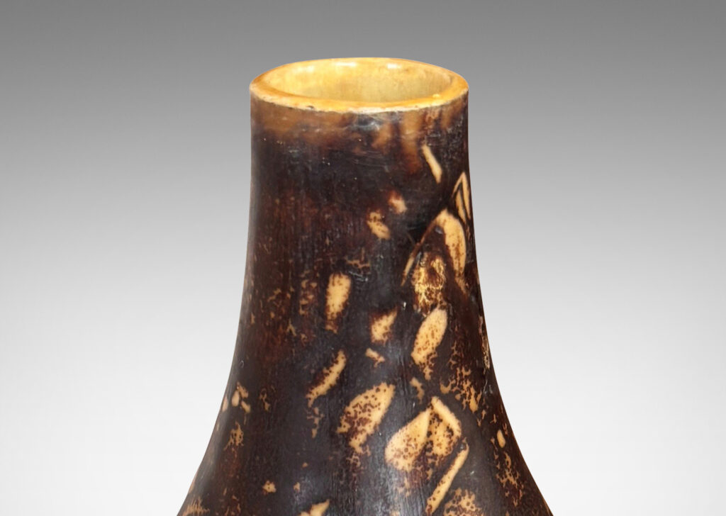 Gallery BAC drop form with floral designs in shallow relief, glazed in pale golden tan and brown