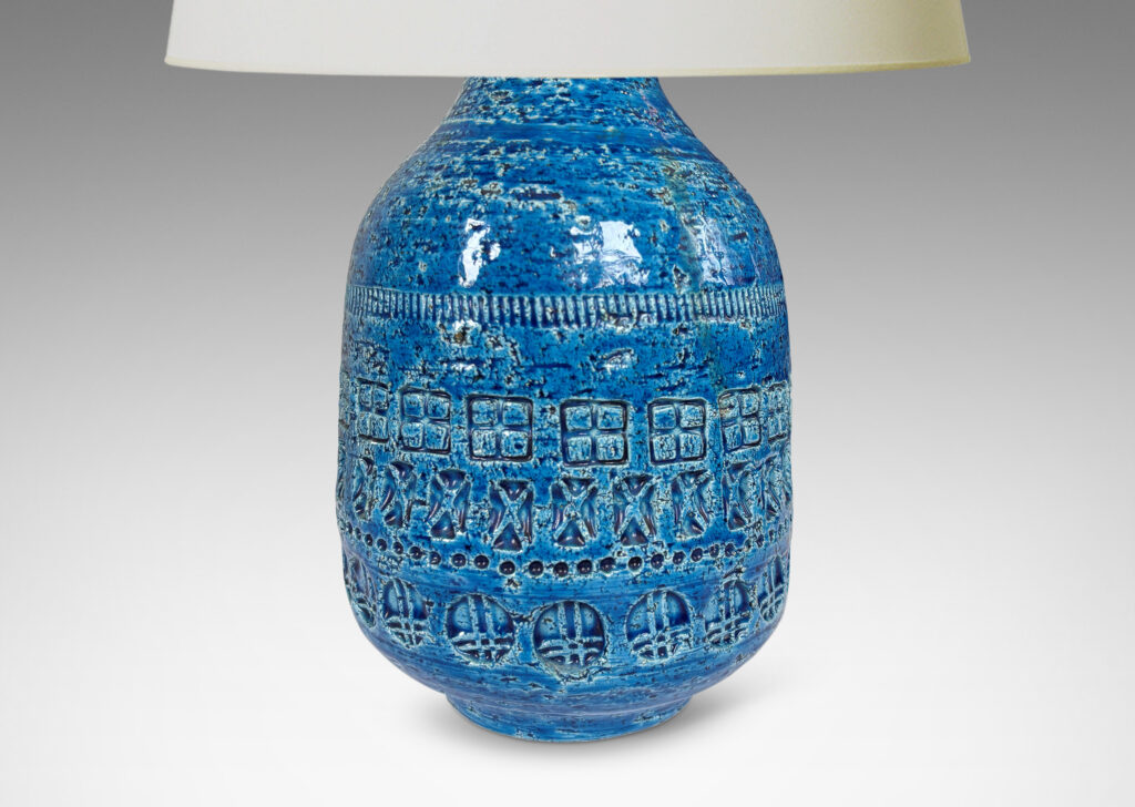Gallery BAC ovoid form with tapered top, ornamented with impressed geometric motifs, glazed in a saturated cerulean blue