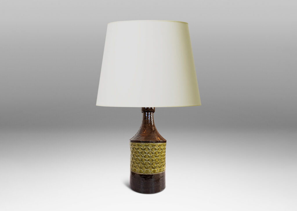 Gallery BAC having a cylindrical form with coved neck and geometric reliefs, glazed in olive green and dark brown