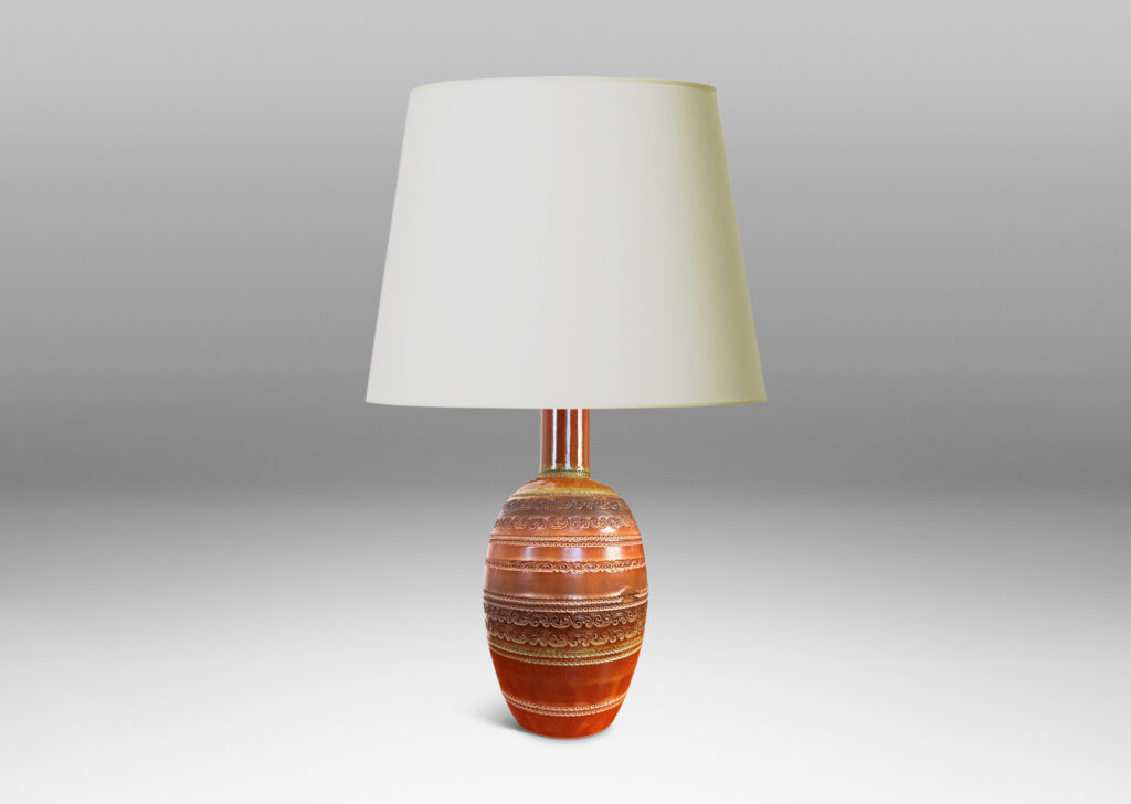 Gallery BAC ovoid form with neck, impressed with bands of ornaments evoking tooled leather, glazed in semi-shine brown, with darker brown and green accents