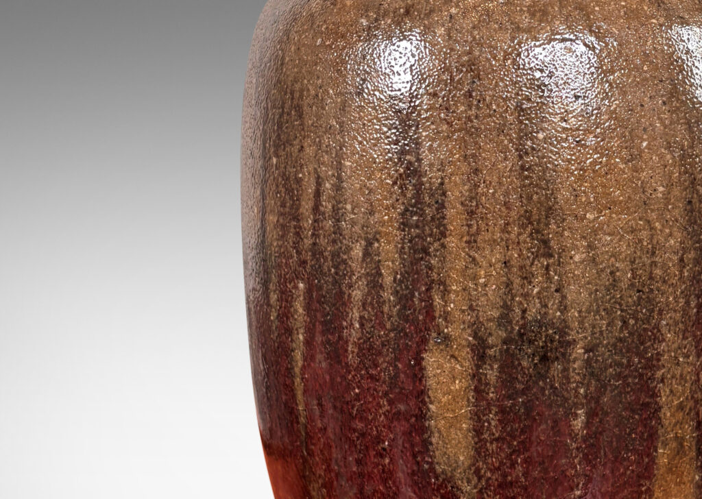 Gallery BAC ovoid form with coved neck, glazed in shiny oxblood burgundy and semi-shine gray-brown