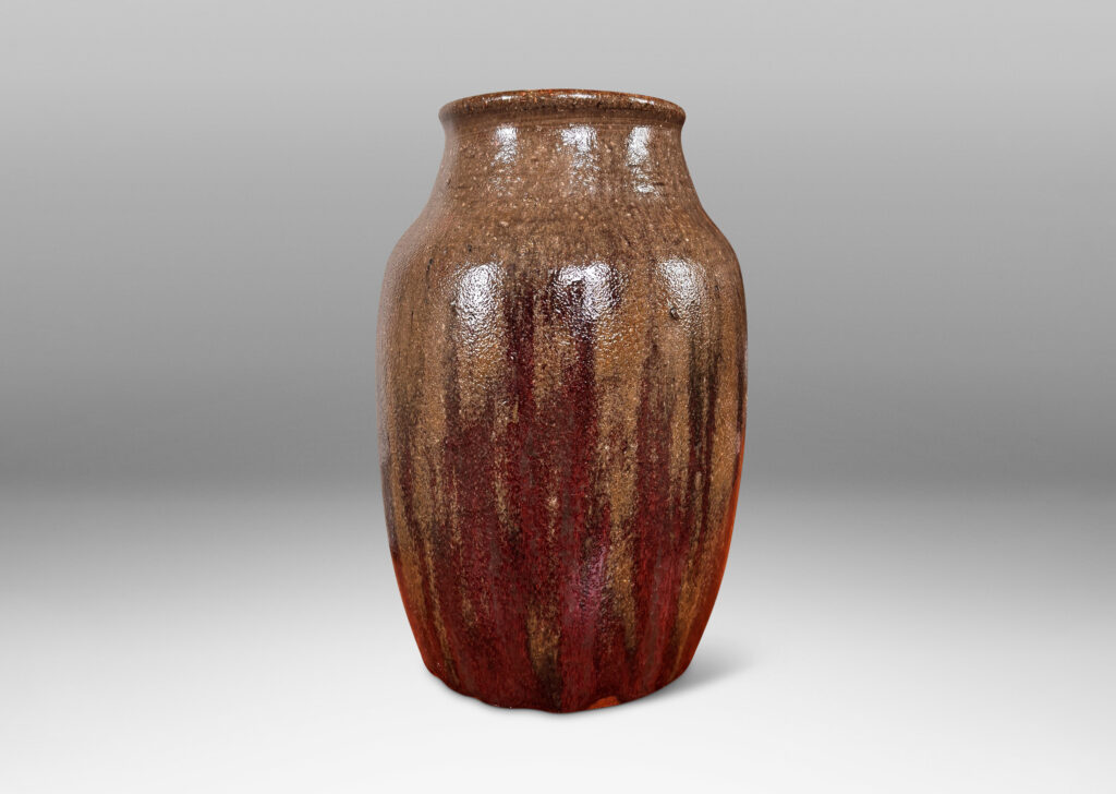 Gallery BAC ovoid form with coved neck, glazed in shiny oxblood burgundy and semi-shine gray-brown