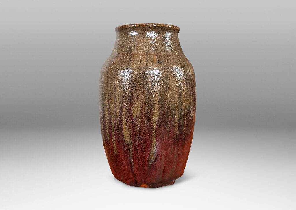 Gallery BAC ovoid form with coved neck, glazed in shiny oxblood burgundy and semi-shine gray-brown