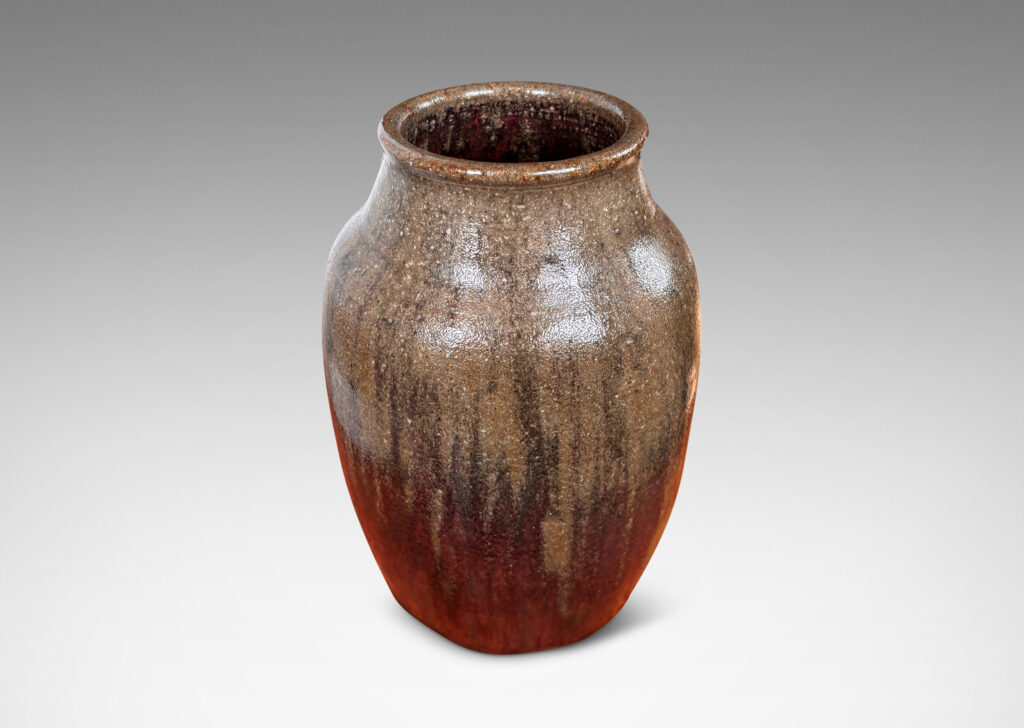 Gallery BAC ovoid form with coved neck, glazed in shiny oxblood burgundy and semi-shine gray-brown