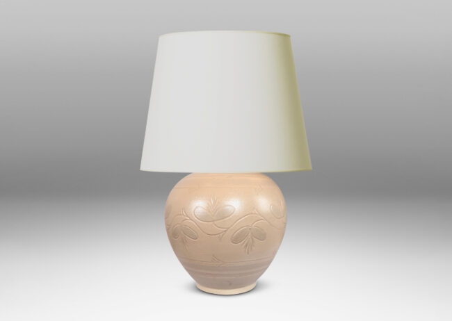 Gallery BAC tapered globe form with carved pinstripe bands and folk style floral ornaments, glazed in an eggshell ivory