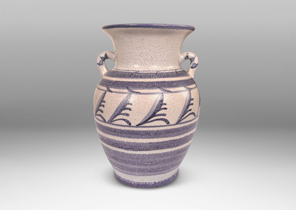 Gallery BAC tapered urn for with wide outstretching mouth and loop handels, in pale craquel gray overglazed with blue-purple bands and foliate designs