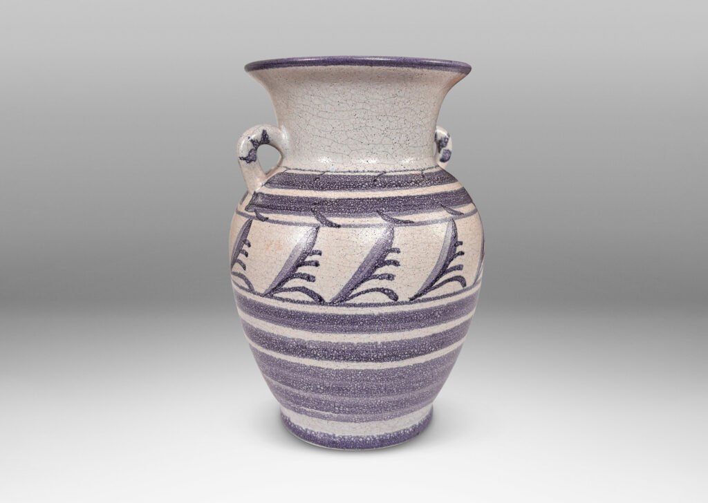 Gallery BAC tapered urn for with wide outstretching mouth and loop handels, in pale craquel gray overglazed with blue-purple bands and foliate designs