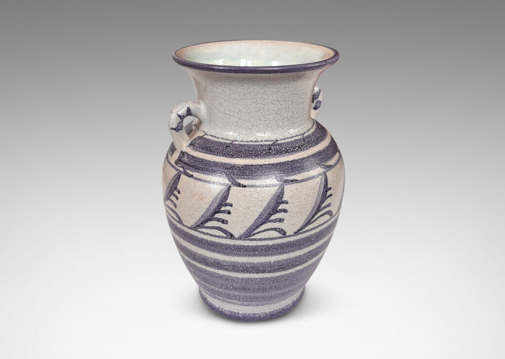 Gallery BAC tapered urn for with wide outstretching mouth and loop handels, in pale craquel gray overglazed with blue-purple bands and foliate designs
