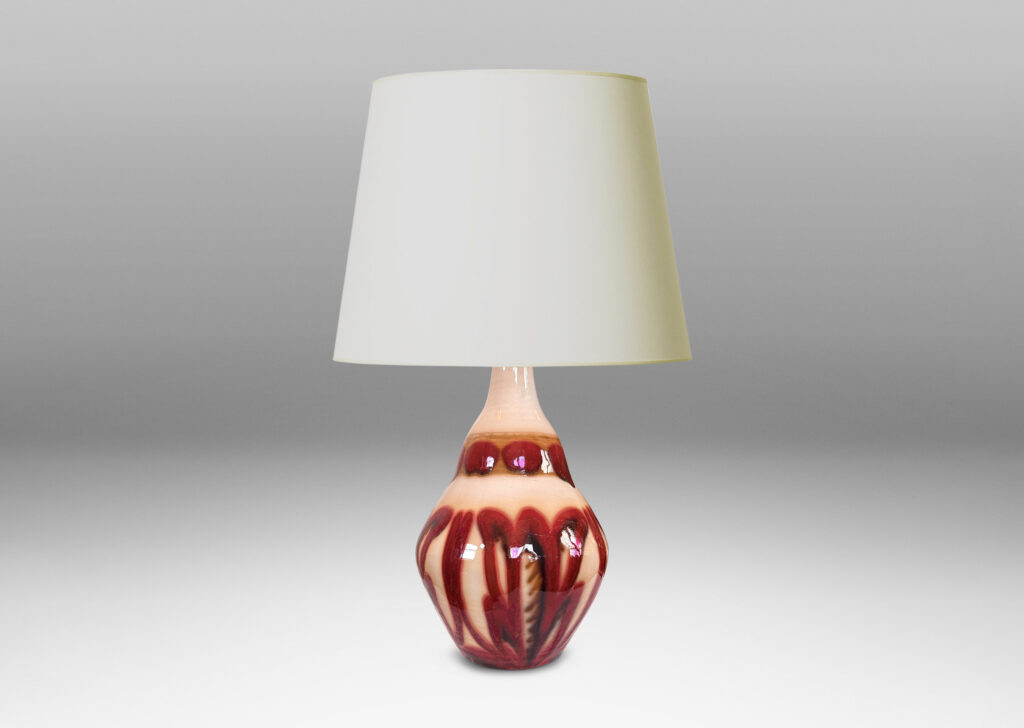 Gallery BAC undulating ginger jar-like form with sprouting neck, glazed in glossy burgundy and brown over beige