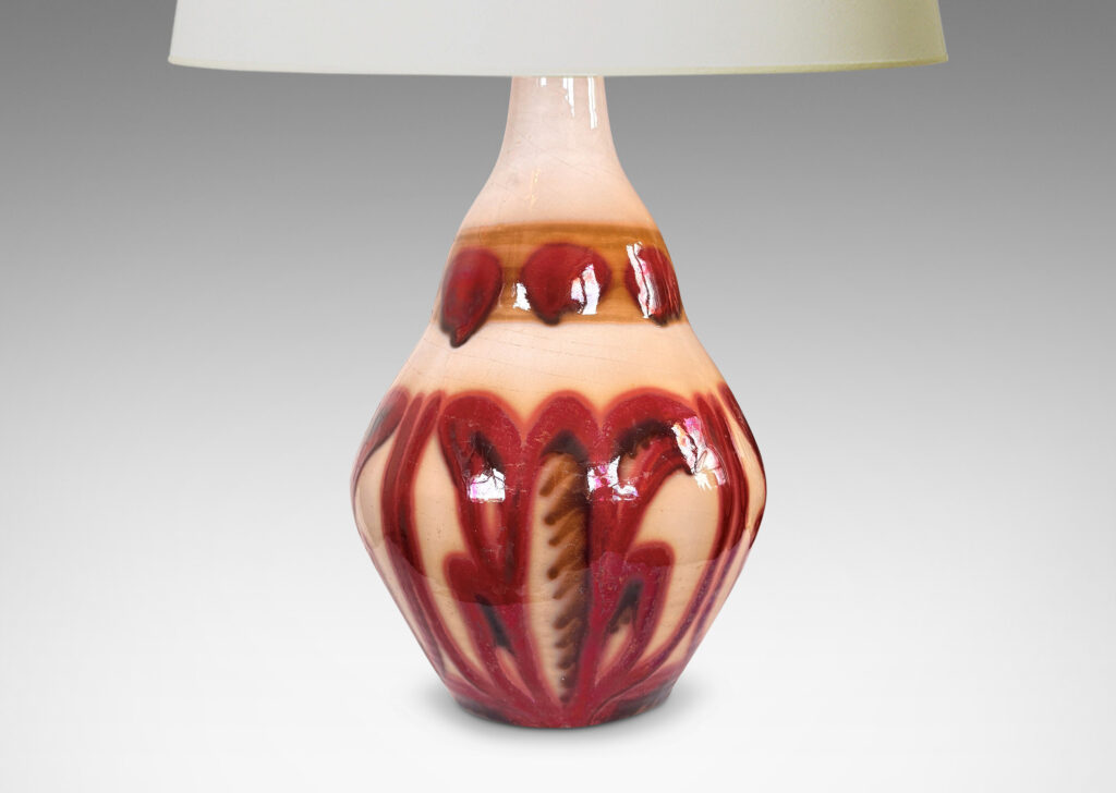 Gallery BAC undulating ginger jar-like form with sprouting neck, glazed in glossy burgundy and brown over beige