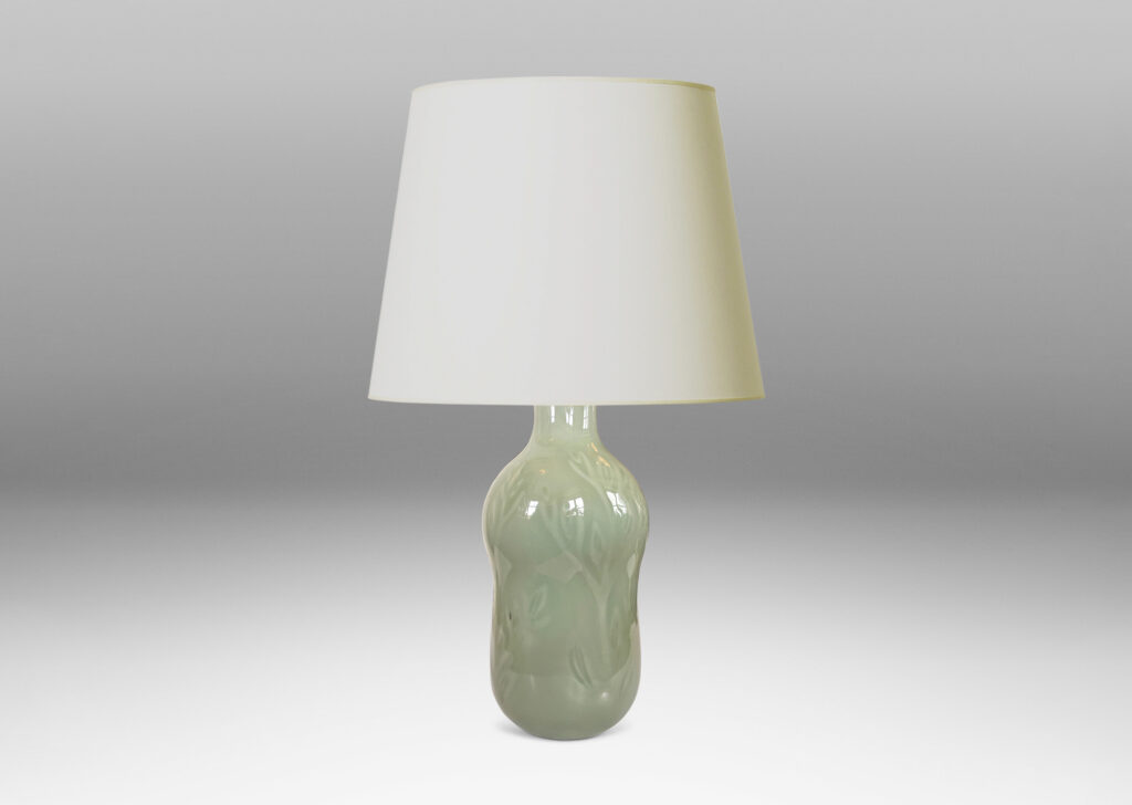 Gallery BAC gourd form with carved floral ornaments, glazed in an ethereal thick celadon