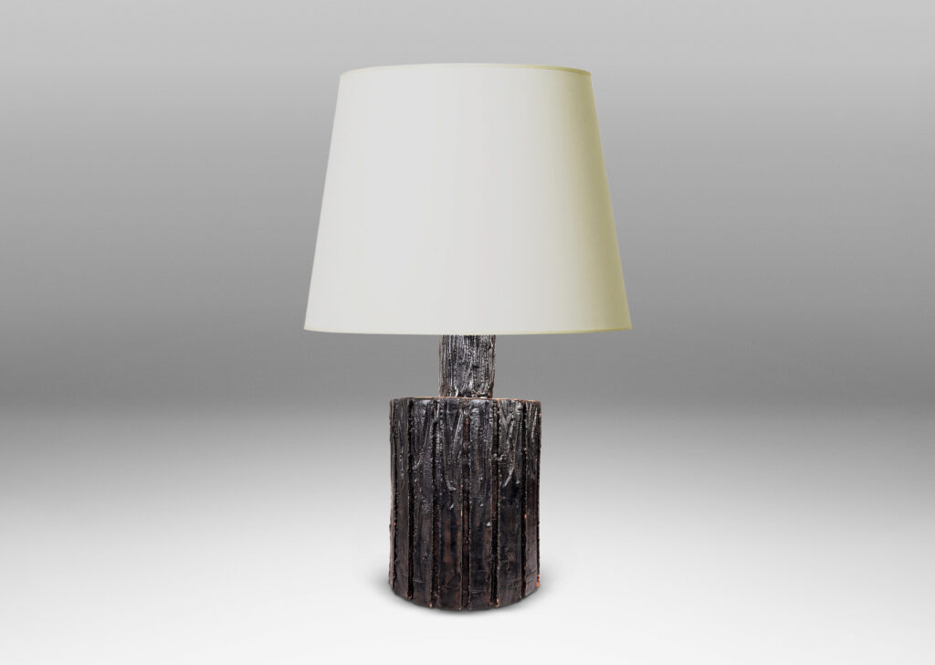 Gallery BAC cylindrical form with carved bark-evoking texture, glazed in a dark black-brown