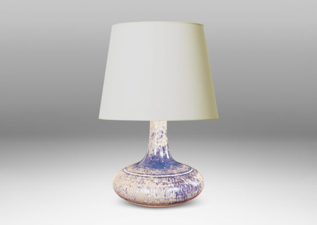 Gallery BAC decanter-like form with a wide compressed base and sprouting neck; glazed in purple and pale gray