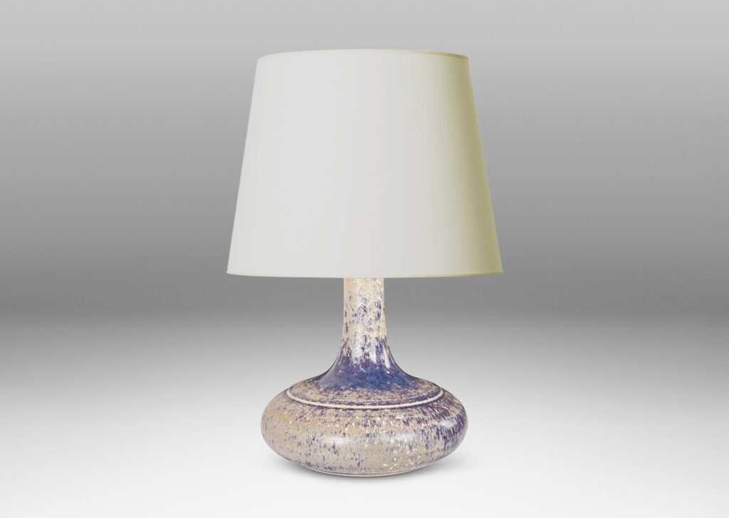 Gallery BAC decanter-like form with a wide compressed base and sprouting neck; glazed in purple and pale gray