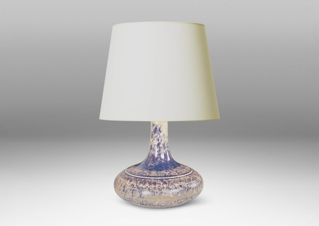 Gallery BAC decanter-like form with a wide compressed base and sprouting neck; glazed in purple and pale gray