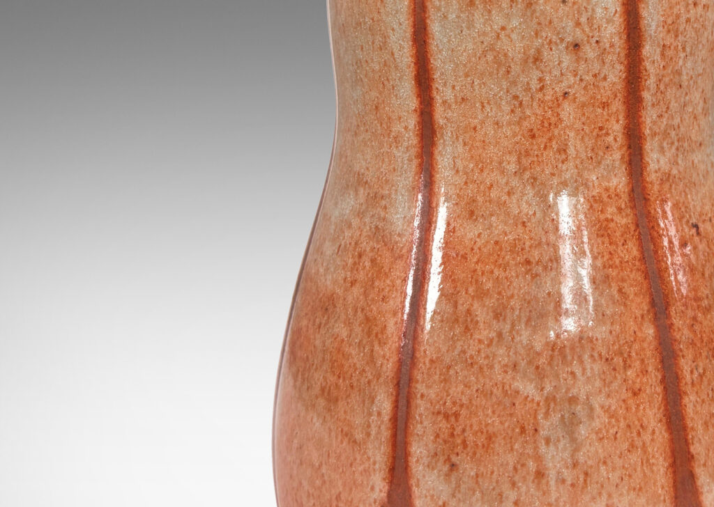 Gallery BAC double gourd form, glazed in matte russet brown, with ovoid shades in shiny tan with brown stippling