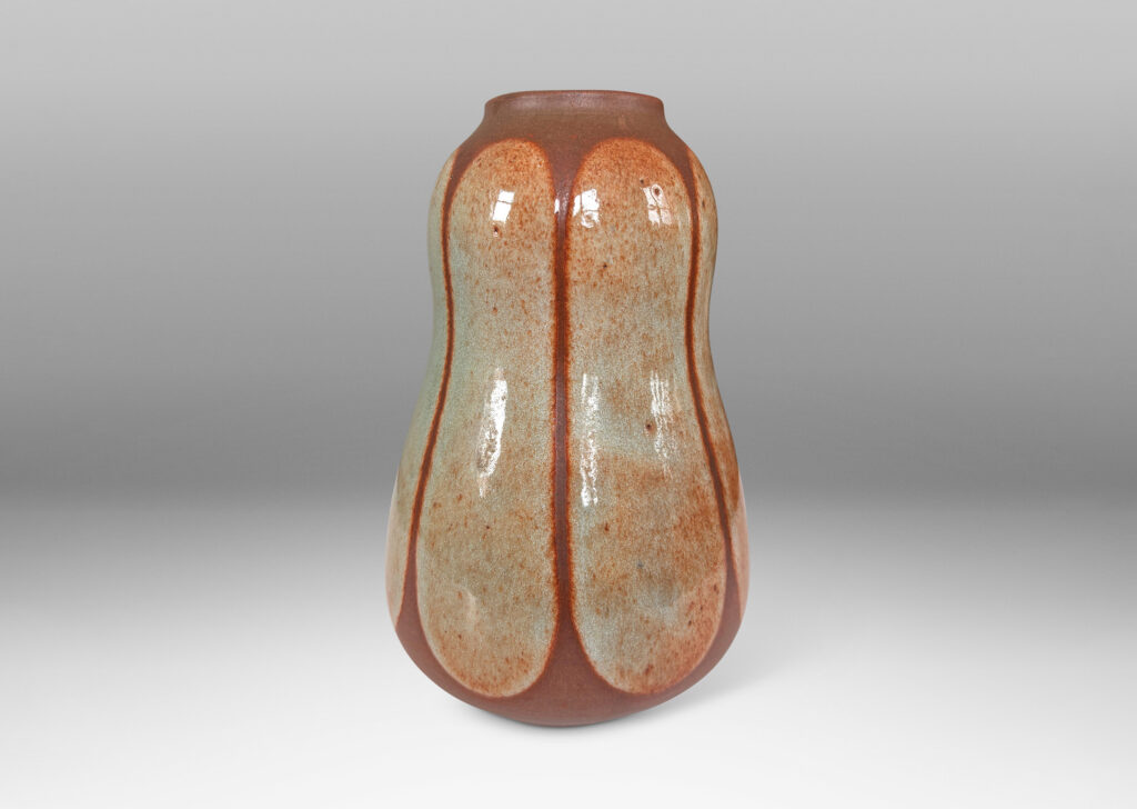 Gallery BAC double gourd form, glazed in matte russet brown, with ovoid shades in shiny tan with brown stippling