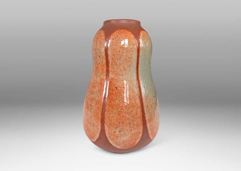 Gallery BAC double gourd form, glazed in matte russet brown, with ovoid shades in shiny tan with brown stippling